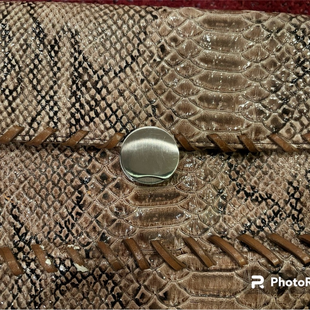 bulaggi Black faux snakeskin clutch. 13”wide x 8 “deep.Never used.